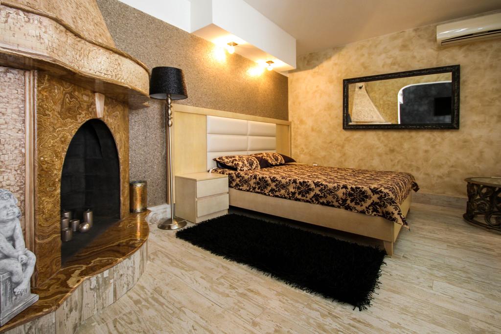 Апартамент "Romantic" с камином, собственной зоной барбекю и шикарным видом на море